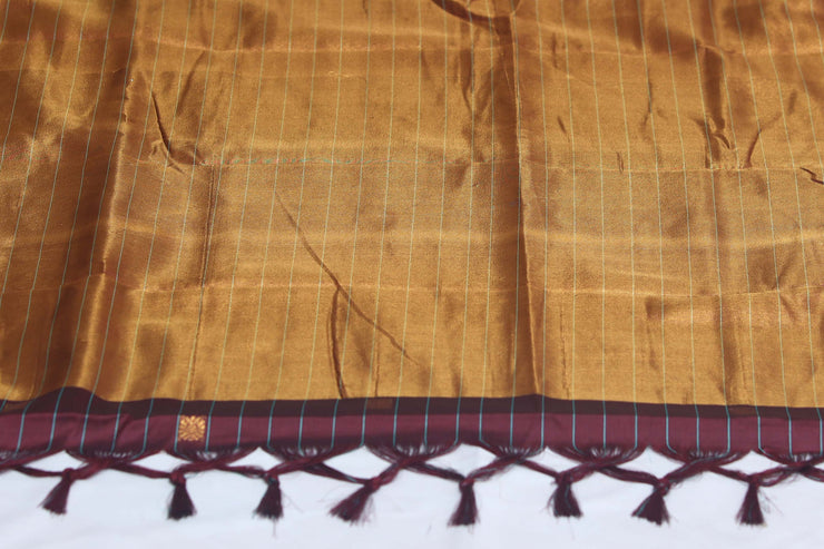 Coffe brown semi silk saree with light blue temple border, with stitched blouse