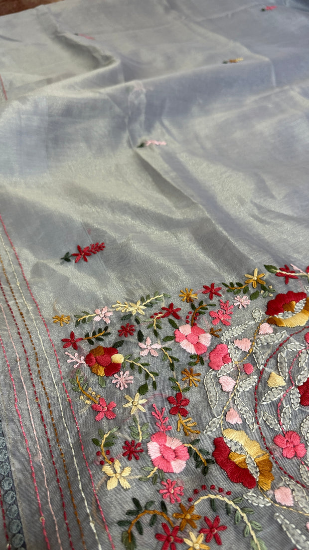 Grey tissue linen saree with hand emroidery and stitched blouse