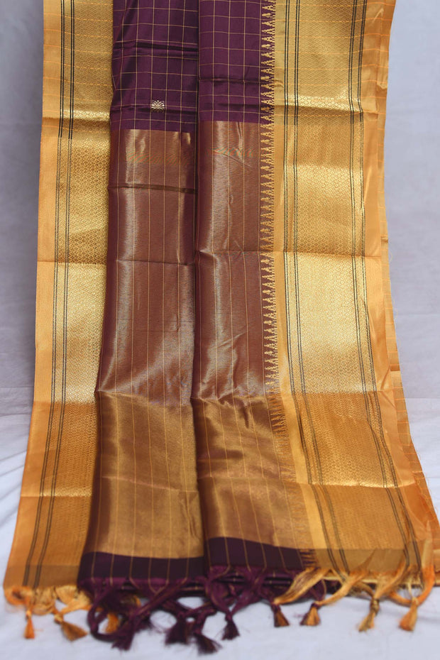 Coffe Brown semi silk saree with yellow temple border, with stitched blouse