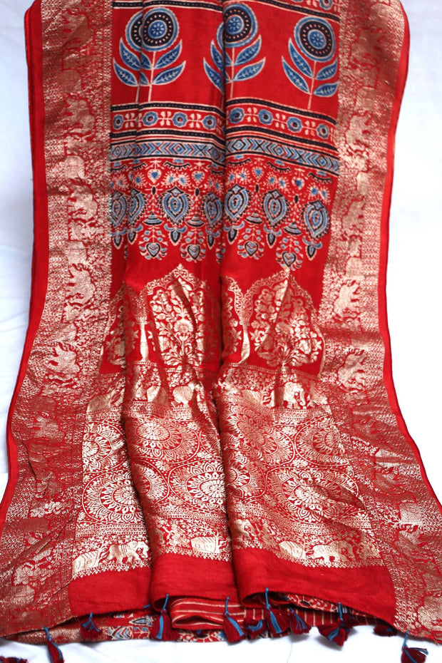 Dola silk saree with Ajrakh hand block print , stitched blouse