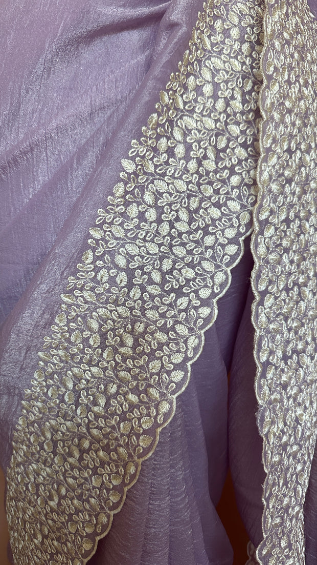 Crushed tissue saree with cut work and stitched blouse