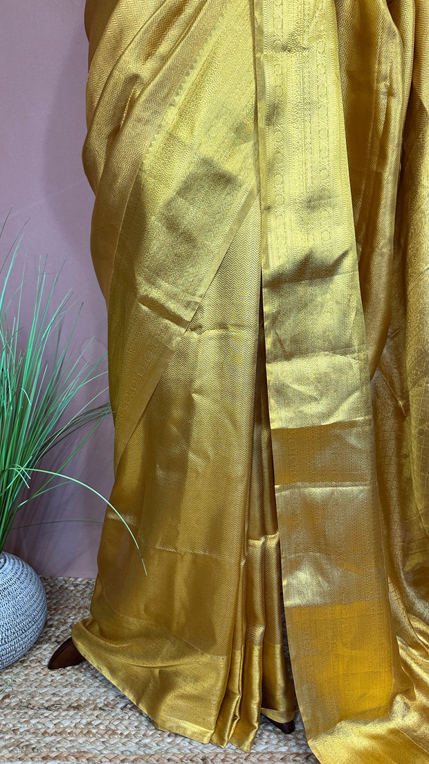 Gold brocade saree with stitched blouse