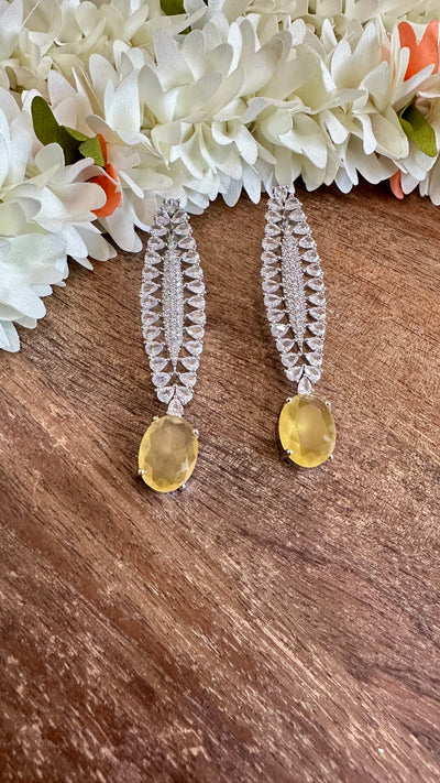 Earring with yellow stone