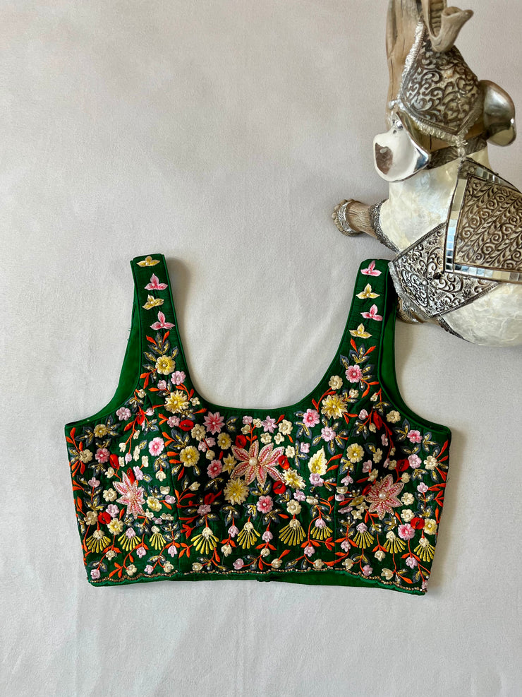 Green sleeveless blouse with stone and bead work