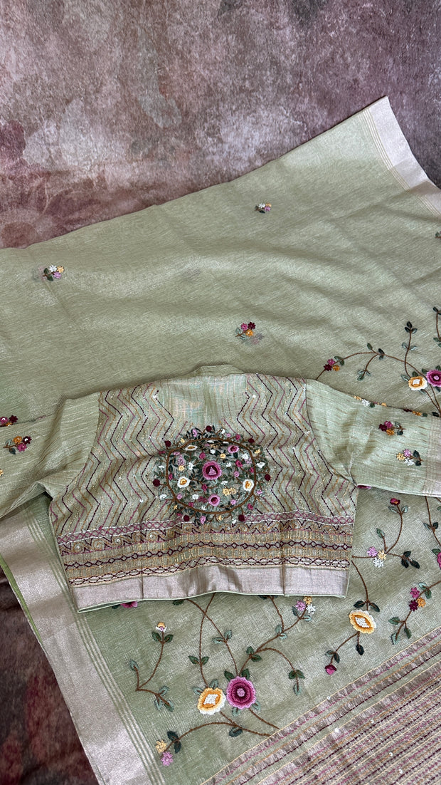 Grey tissue linen saree with hand emroidery and stitched blouse