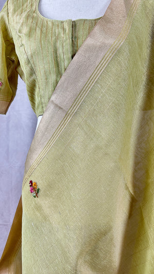 Grey tissue linen saree with hand emroidery and stitched blouse