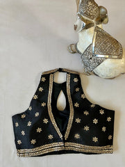 Black halter neck blouse with blouse kundan stone work