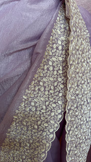 Crushed tissue saree with cut work and stitched blouse