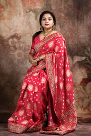 Red dola silk saree with zardosi hand work , with stitched blouse