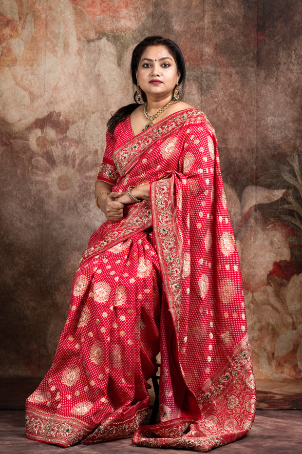 Red dola silk saree with zardosi hand work , with stitched blouse