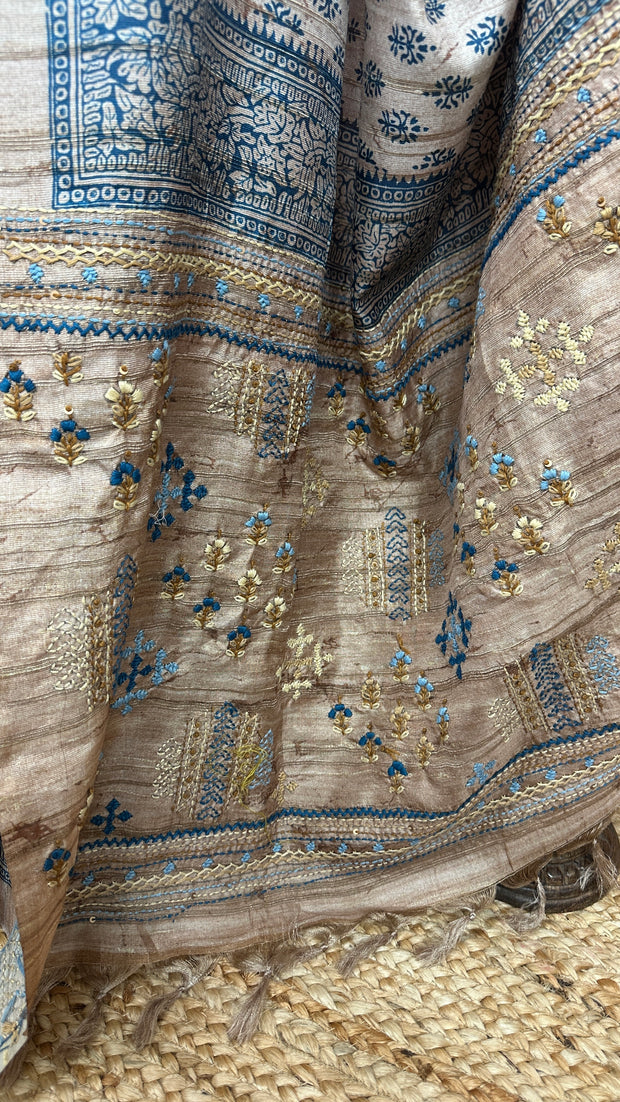 Printed Tussar silk saree with hand emroidery and stitched blouse