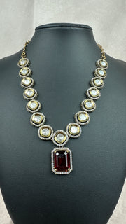 Moissanite necklace with red stone