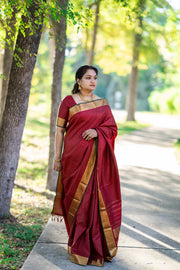 Maroon Kanchivaram silk hand woven saree with stitched blouse