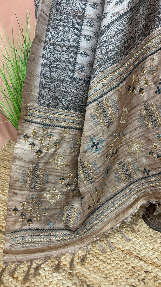 Printed Tussar silk saree with hand emroidery and stitched blouse