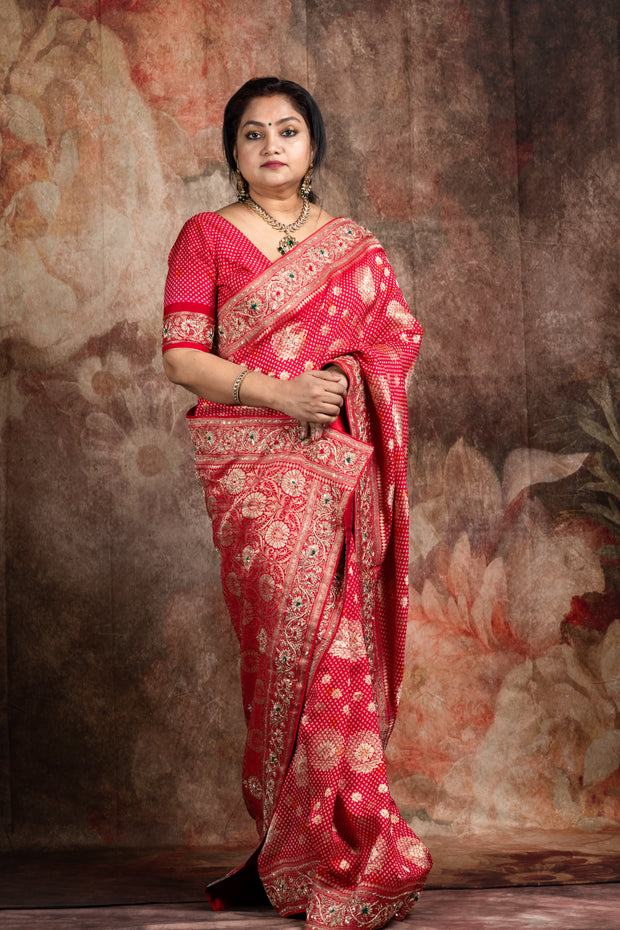 Red dola silk saree with zardosi hand work , with stitched blouse