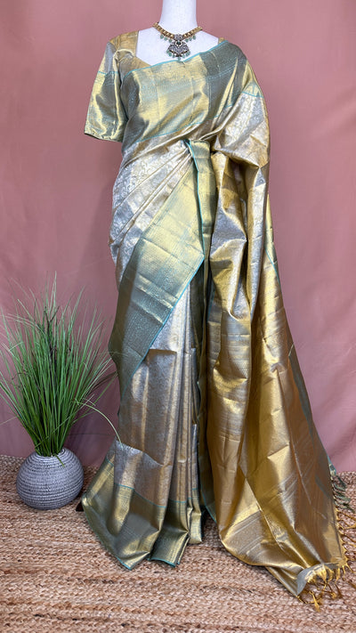 Gold and pastel green brocade kanchivaram pure silk saree with stitched blouse