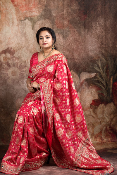 Red dola silk saree with zardosi hand work , with stitched blouse