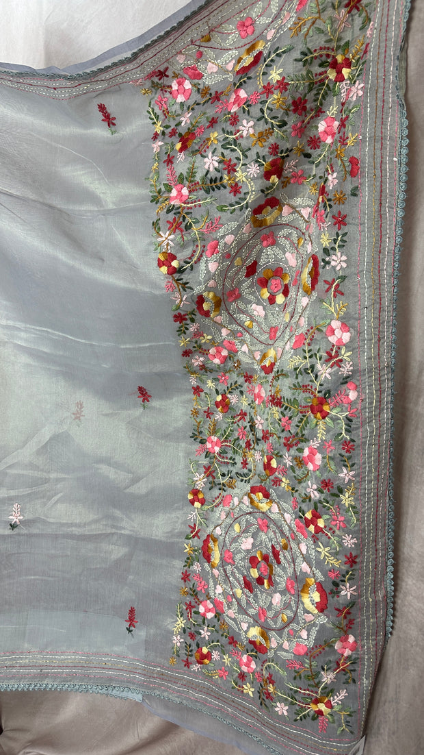 Grey tissue linen saree with hand emroidery and stitched blouse