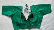 Green silk blouse with gold and silver weave