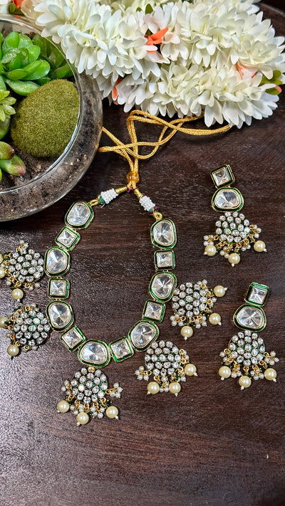 Necklace with moissantie stones and pachi kundan , earring