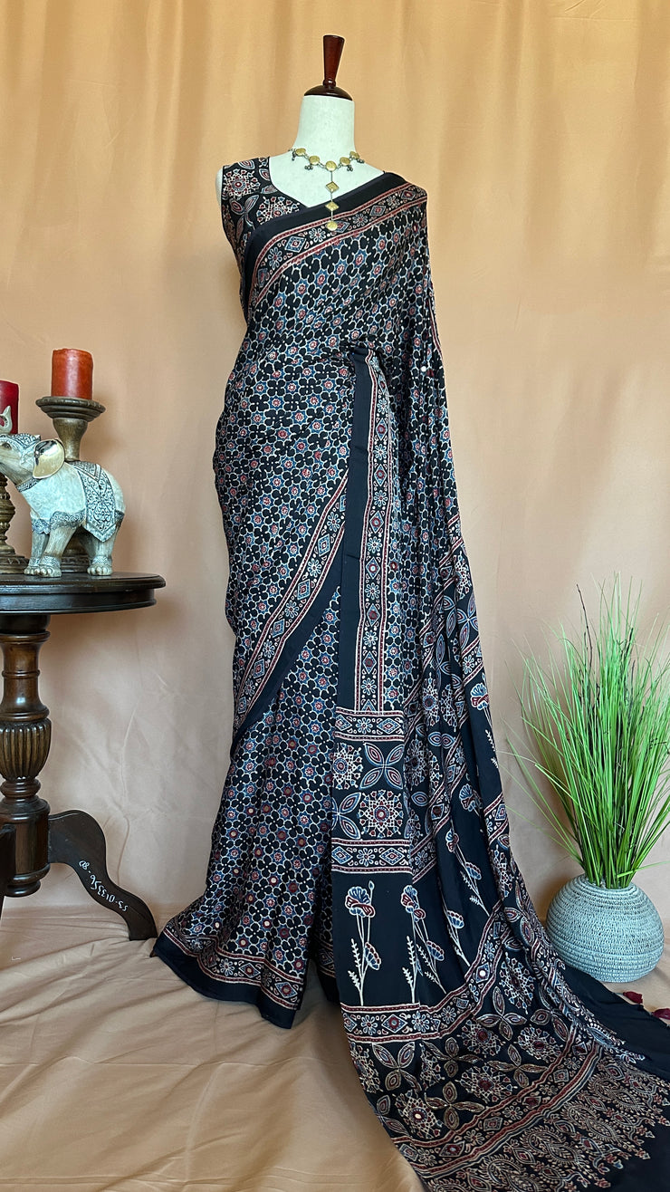 Ajrakh hand block printed Modal silk saree with bead and mirror wirk, with stitched blouse