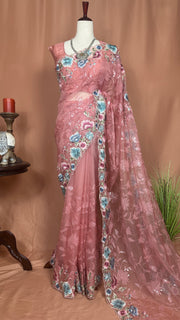 Coral soft organza saree with sequins and embroidery, with stitched blouse