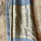 Hand woven Grey Kora Banarsi saree with silver and gold zari stitched blouse