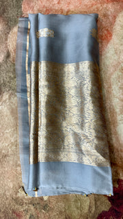 Hand woven Grey Kora Banarsi saree with silver and gold zari stitched blouse
