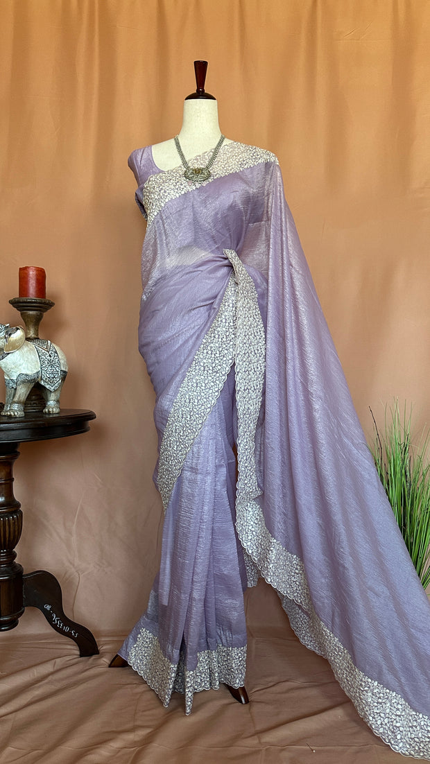 Crushed tissue saree with cut work and stitched blouse