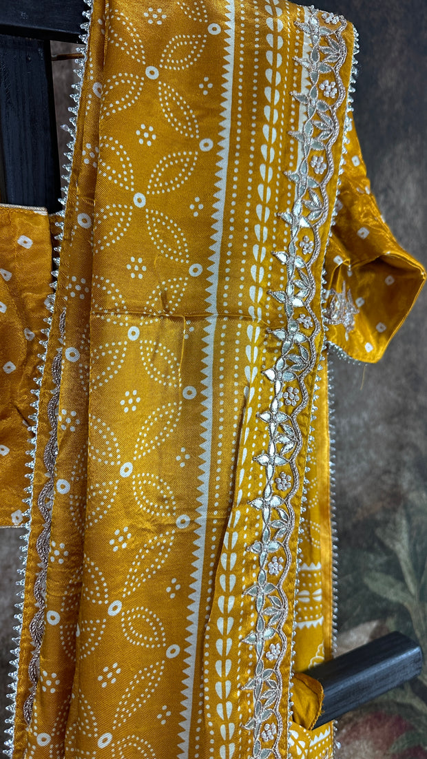 Mustard yellow modal silk saree with gotta work border, stitched blouse