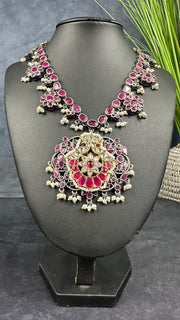 Silver replica necklace with ruby red stones jadau kundan and earrings