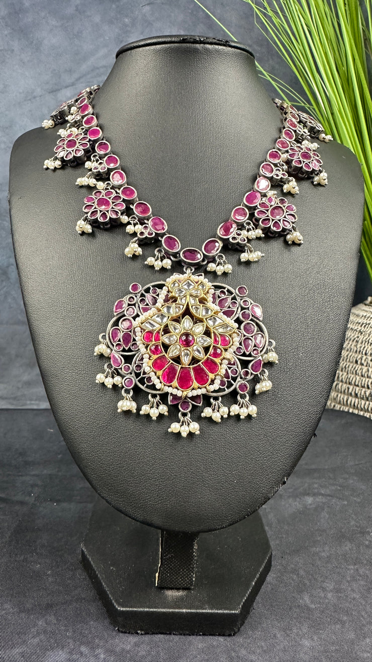 Silver replica necklace with ruby red stones jadau kundan and earrings