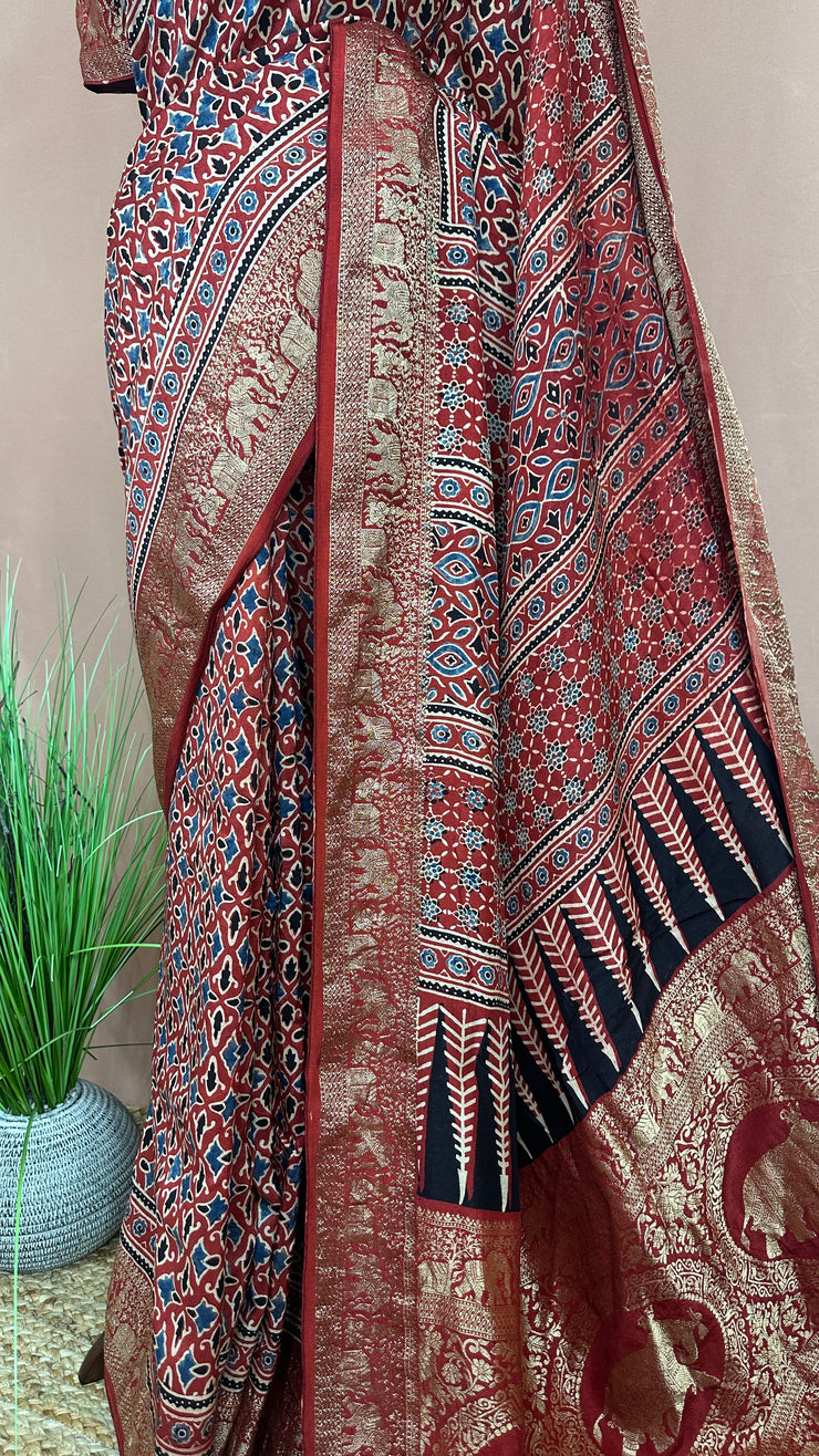 Dola silk saree with Ajrakh hand block print , stitched blouse