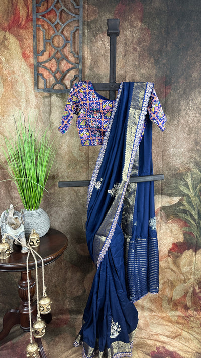 Navy blue Dola silk saree with hand embroidery, with designer blouse