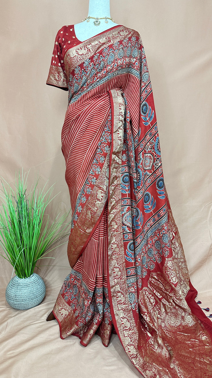 Dola silk saree with Ajrakh hand block print , stitched blouse