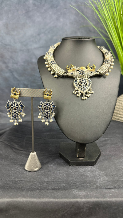 Silver replica necklace with blue stones and earrings