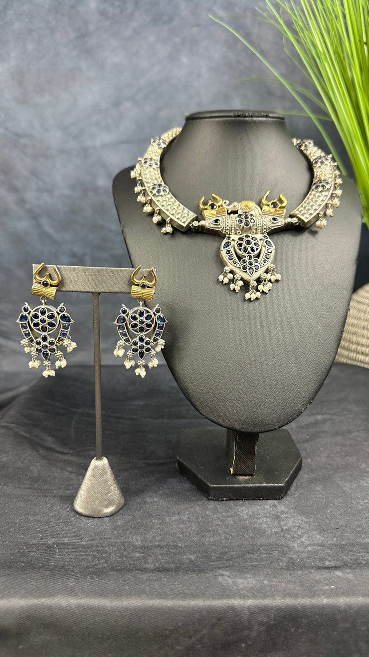 Silver replica necklace with blue stones and earrings