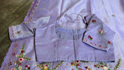 Lilac tissue linen saree with hand emroidery and stitched blouse