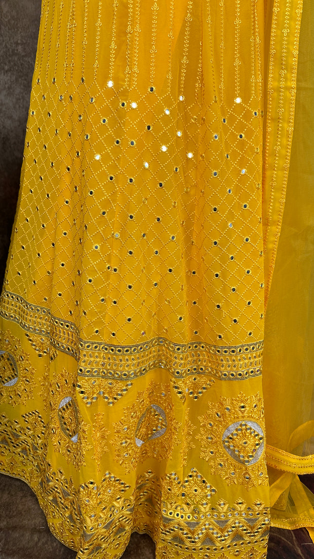 Yellow chikankari lehenga with foil mirror work