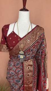 Red Ajrakh dola silk saree with hand work , with stitched blouse