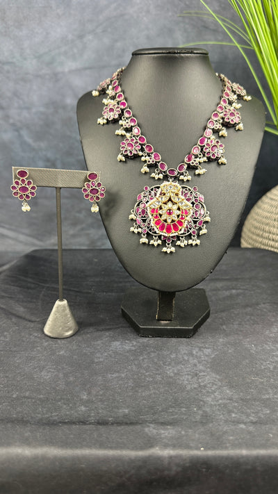 Silver replica necklace with ruby red stones jadau kundan and earrings