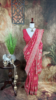 Red dola silk saree with zardosi hand work , with stitched blouse