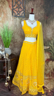 Yellow chikankari lehenga with foil mirror work