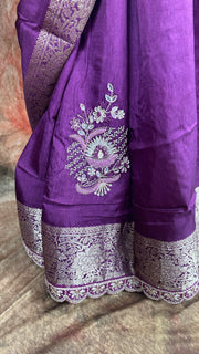 Purple Dola silk saree with hand embroidery, with light purple blouse.