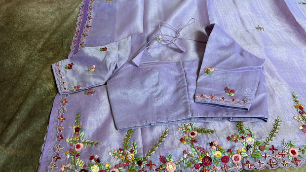 Lilac tissue linen saree with hand emroidery and stitched blouse