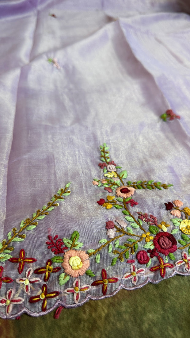 Lilac tissue linen saree with hand emroidery and stitched blouse