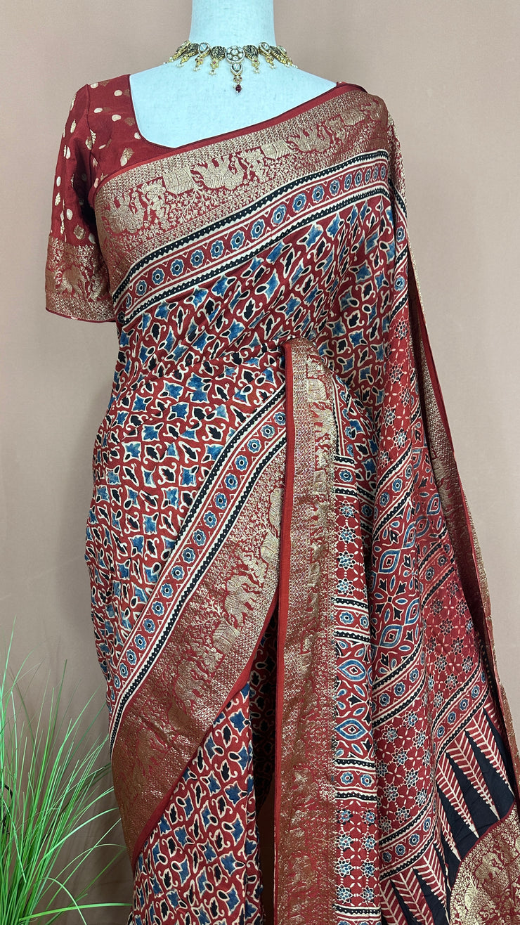 Dola silk saree with Ajrakh hand block print , stitched blouse