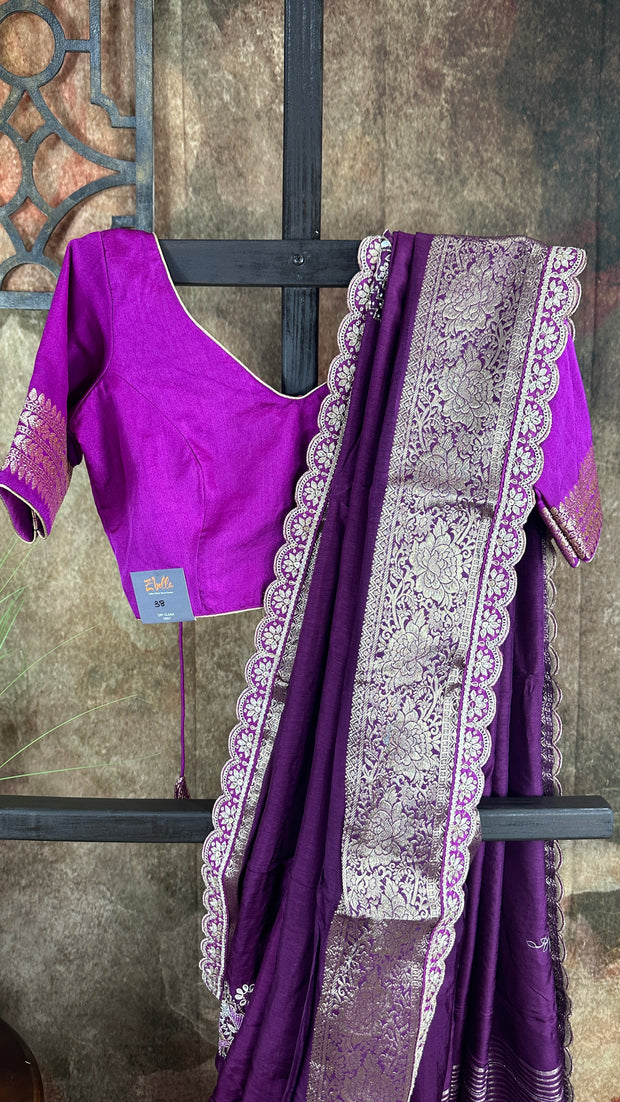 Purple Dola silk saree with hand embroidery, with light purple blouse.