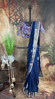 Navy blue Dola silk saree with hand embroidery, with designer blouse