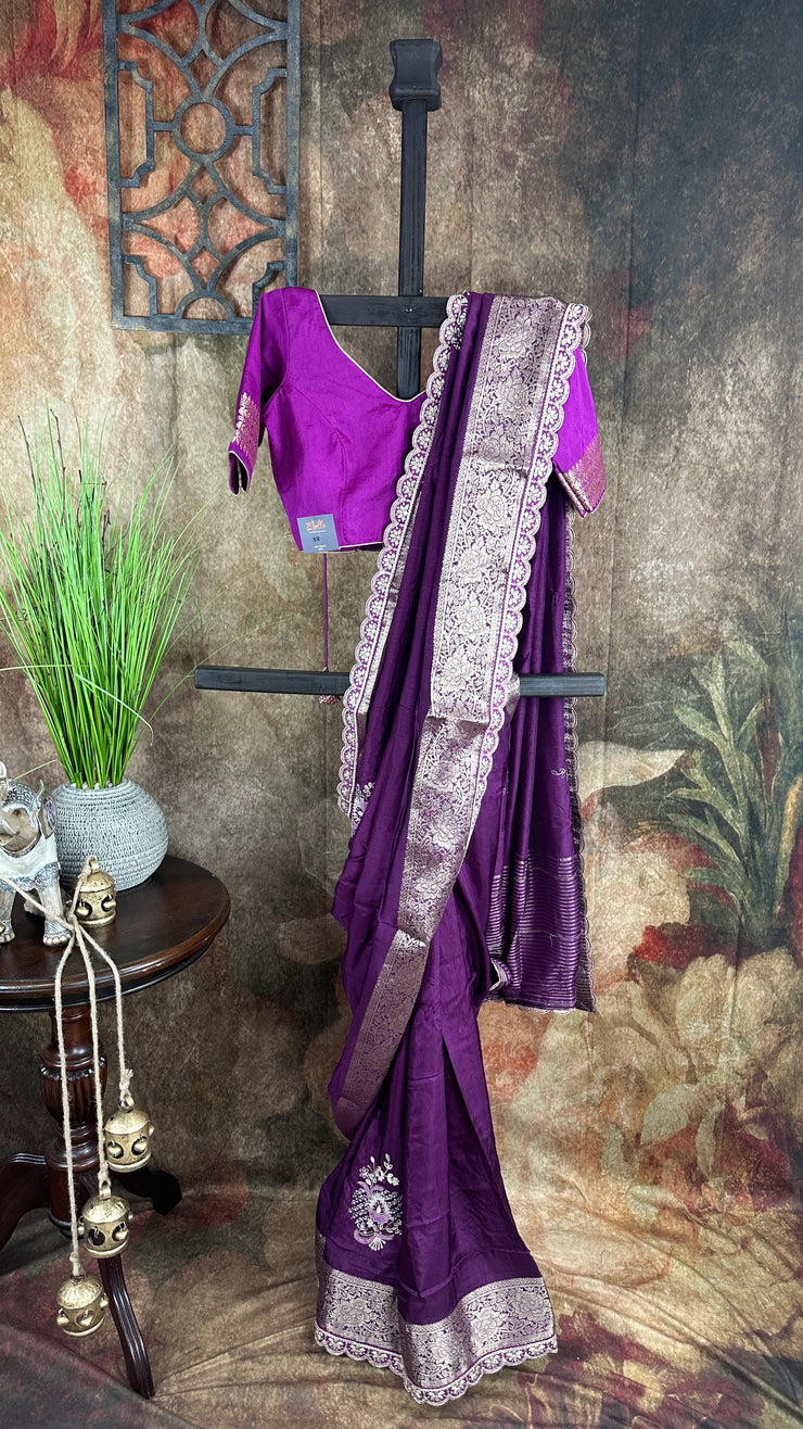 Purple Dola silk saree with hand embroidery, with light purple blouse.